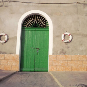 Lampedusa, Italy - Green door entrance